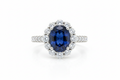 Sapphire ring with diamond halo in white gold setting