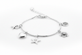 Sterling silver charm bracelet with heart, star, and flower charms